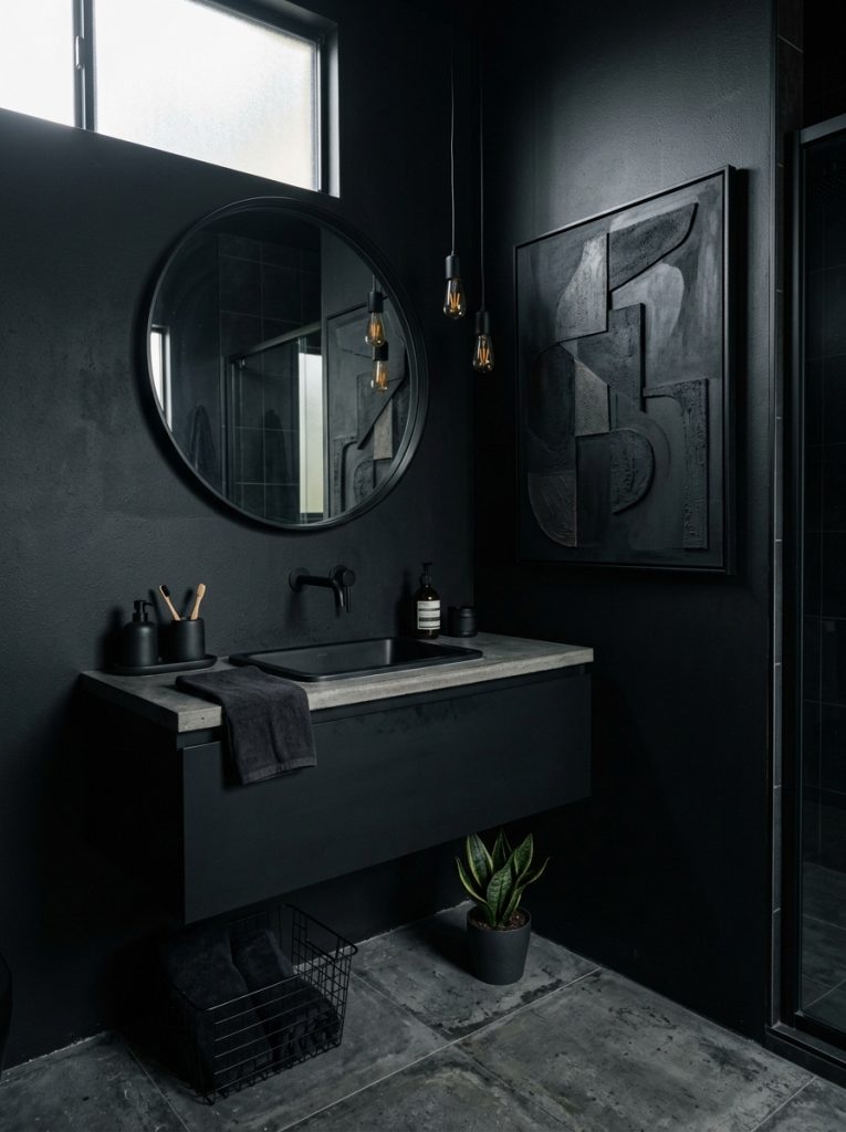 Edgy dark bathroom aesthetic with all black walls black mirror black sink black faucet dark concrete tiles and bold abstract wall art